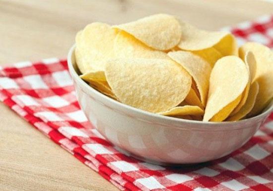 مضرات چیپس؛ این خوراکی خوشمزه مضرات چیپس؛ این خوراکی خوشمزه
